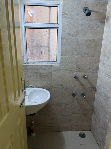 Bathroom in 1 BHK Apartment at Wave Dream Homes, Wave City – for Rent