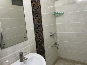 Bathroom in 3 BHK Apartment at RWA Azadpur Colony, Model Town – for Rent