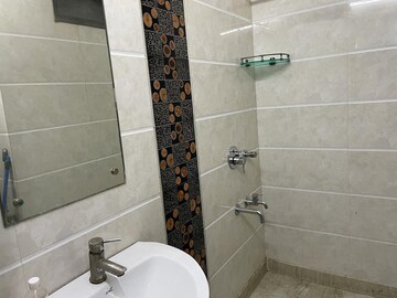 Bathroom in 3 BHK Apartment at RWA Azadpur Colony, Model Town – for Rent