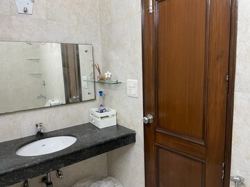 Bathroom in 3 BHK Apartment at RWA Azadpur Colony, Model Town – for Rent