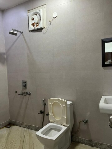 Bathroom in 3 BHK Apartment at RWA Azadpur Colony, Model Town – for Rent