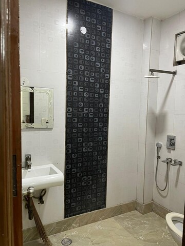 Bathroom in 3 BHK Apartment at RWA Azadpur Colony, Model Town – for Rent