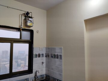Kitchen in 2 BHK Apartment at Rajaram Sukur Enclave D Wing, Ghodbunder Road – for Sale
