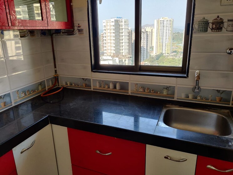 Kitchen, rajaram-sukur-enclave-d-wing 2 Bedroom 614 Sq.Ft. Apartment In Ghodbunder Road Thane 9029372