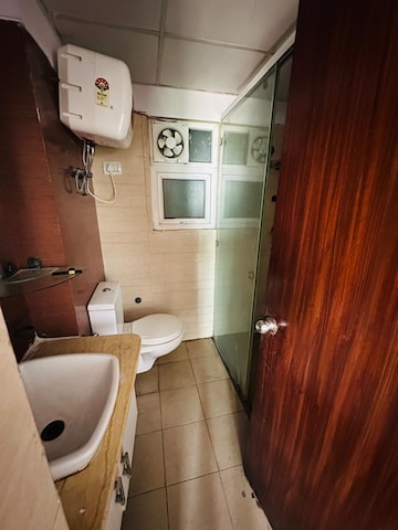 Bathroom in 3 BHK Apartment at Mahagun Moderne, Sector 78 – for Rent