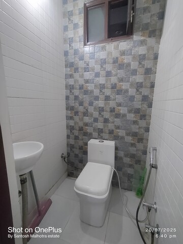 Bathroom in 2 BHK Builder Floor at Dwarka Mor – for Rent