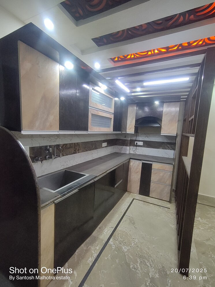 Kitchen, dwarka mor 2 Bedroom 70 Sq.Yd. Builder Floor In Dwarka Mor Delhi 9029550
