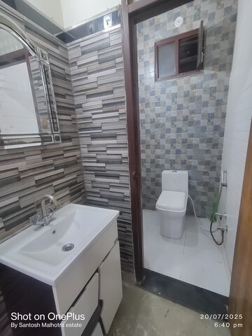 Bathroom in 2 BHK Builder Floor at Dwarka Mor – for Rent