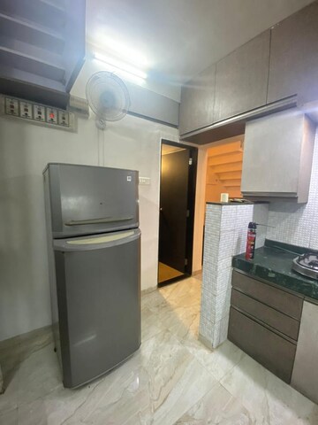 Kitchen in 3 BHK Apartment at Nilanjali CHS, Kalyani Nagar – for Rent