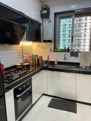 Kitchen in 3 BHK Apartment at Sheth Vasant Lawns, Laxmi Nagar – for Sale