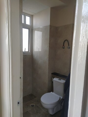 Bathroom in 2 BHK Apartment at Wave Executive Floors, Wave City – for Rent