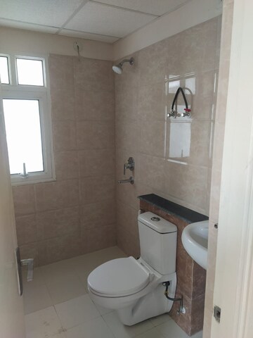 Bathroom in 2 BHK Apartment at Wave Executive Floors, Wave City – for Rent