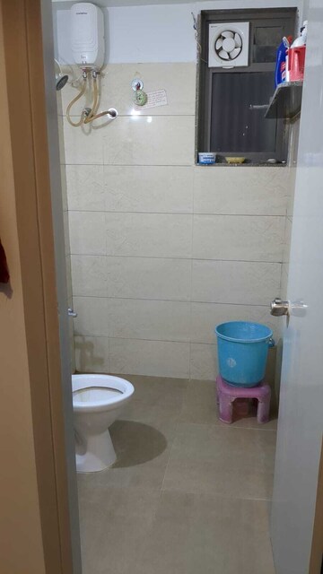 Bathroom in 1.5 BHK Apartment at Shree Radha Jaldeep Icon, Makarba – for Rent