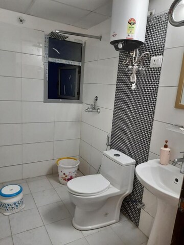 Bathroom in 3 BHK Apartment at Gulshan Bellina, Sector 16 Greater Noida – for Rent