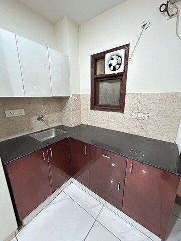 Kitchen in 1 RK Builder Floor at Sushant Lok I – for Rent