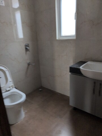 Bathroom in 3.5 BHK Apartment at Smart World Gems, Sector 89 – for Rent