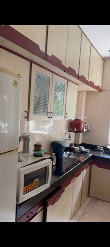 Kitchen in 1 BHK Apartment at Nav Aasawari CHS, Andheri East – for Rent