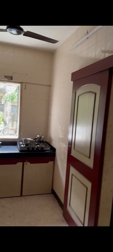 Kitchen in 1 BHK Apartment at Nav Aasawari CHS, Andheri East – for Rent
