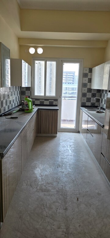 Kitchen in 2 BHK Apartment at Supertech Cape Town, Sector 74 – for Sale