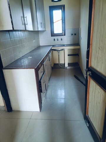 Kitchen in 3.5 BHK Apartment at AWHO Brahmaputra Apartments, Sector 29 – for Rent