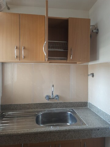 Kitchen in 4 BHK Apartment at Emaar Emerald Floors Premier, Sector 65 – for Rent