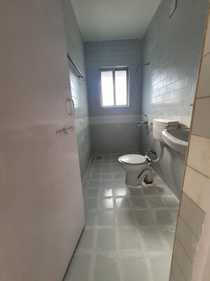 Bathroom in 2 BHK Apartment at Simran Orchid, Salunkhe Vihar Society – for Rent