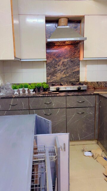 Kitchen in 2 BHK Apartment at Aditya Celebrity Homes, Sector 76 – for Rent