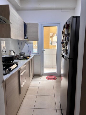 Kitchen in 2 BHK Apartment at Bhartiya Nikoo Homes, Thanisandra Main Road – for Rent