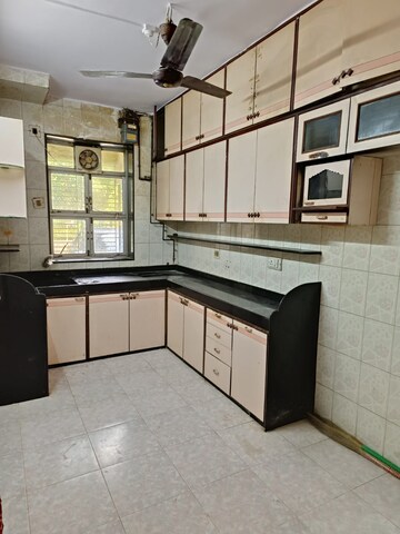Kitchen in 1.5 BHK Apartment at Vanamali Apartment, Ghatkopar East – for Sale