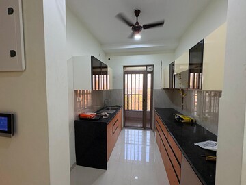 Kitchen in 2 BHK Apartment at Kalpataru Paramount, Kapur Bawdi – for Rent