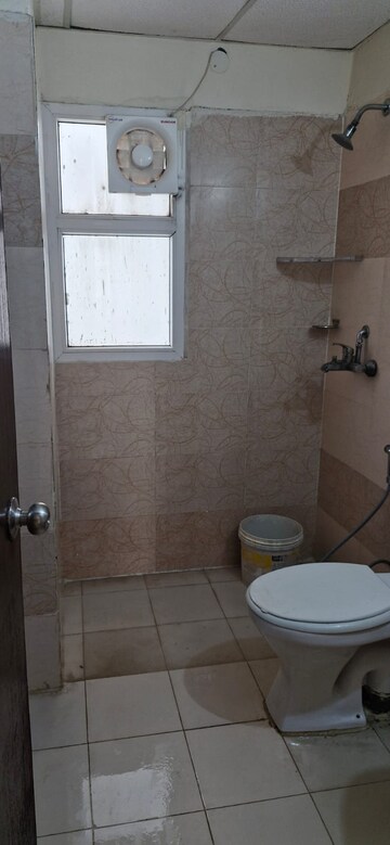 Bathroom in 3 BHK Apartment at Antriksh Golf View, Sector 78 – for Rent
