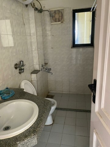 Bathroom in 3 BHK Apartment at Hiranandani Gardens Valencia, Powai – for Rent
