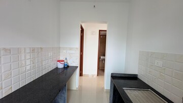 Kitchen in 2 BHK Apartment at Kalpataru Immensa, Kolshet Road – for Rent