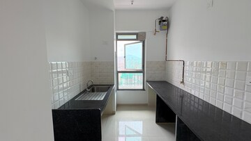 Kitchen in 2 BHK Apartment at Kalpataru Immensa, Kolshet Road – for Rent
