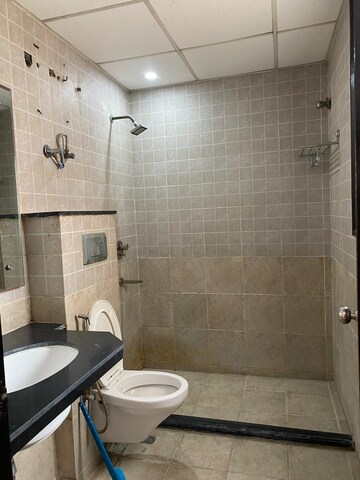 Bathroom in 2 BHK Apartment at Eros Kenwood Tower, Sector 39 – for Rent