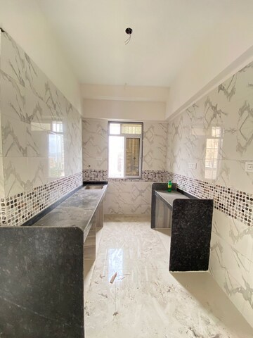 Kitchen in 1 BHK Apartment at DGS Sheetal Tapovan, Malad East – for Sale