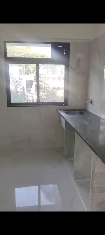 Kitchen in 1 BHK Apartment at Sudarsan Panchsheel, Andheri East – for Sale