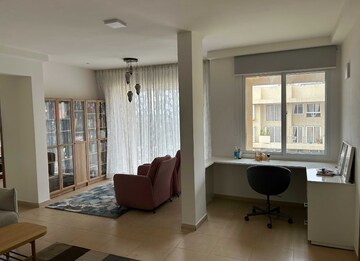 Living Room in 2 BHK Apartment at Bhartiya Nikoo Homes Phase 2, Thanisandra Main Road – for Rent