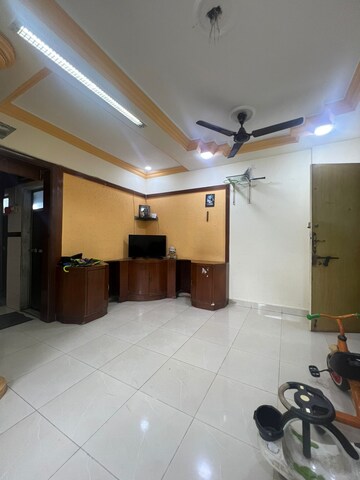 Living Room in 2 BHK Apartment at Parsik Nagar – for Sale