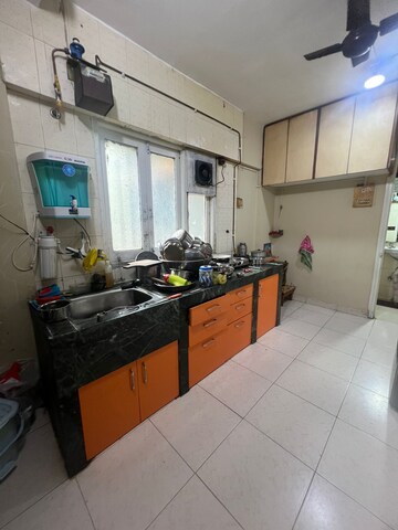Kitchen in 2 BHK Apartment at Parsik Nagar – for Sale
