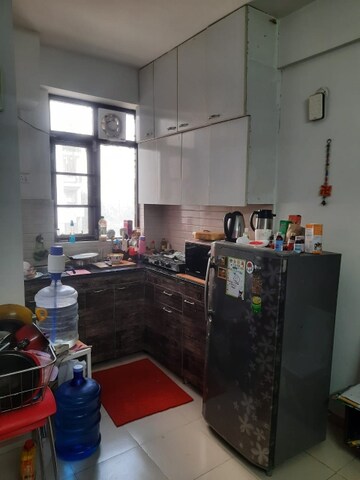 Kitchen in 1 BHK Apartment at Auric City Homes, Sector 82 – for Rent
