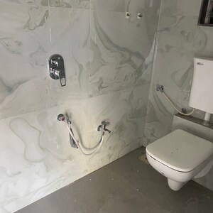 Bathroom in 2 BHK Apartment at Tirupati Pushpa Enclave, Miragaon – for Sale