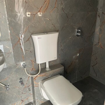 Bathroom in 2 BHK Apartment at Tirupati Pushpa Enclave, Miragaon – for Sale