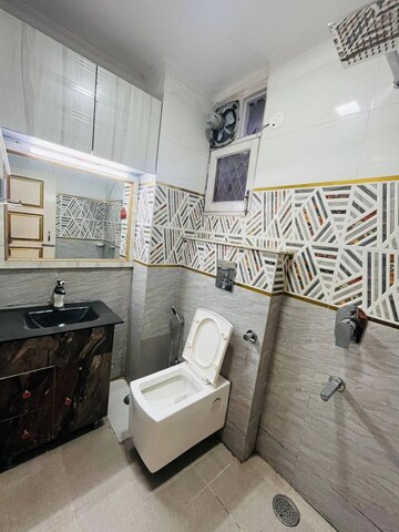 Bathroom in 1 BHK Apartment at Freedom Fighters Enclave – for Rent