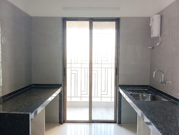 Kitchen in 2 BHK Apartment at Regency Antilia Phase V Avana, Ulhasnagar – for Sale