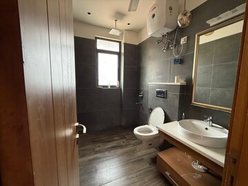 Bathroom in 4 BHK Builder Floor at Ansal Sushant Lok I, Sector 43 – for Rent