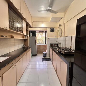 Kitchen in 2 BHK Apartment at Hiranandani Garden Eden III, Jalvayu Vihar – for Rent