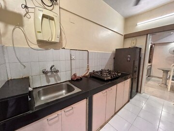 Kitchen in 2 BHK Apartment at Hiranandani Garden Eden IV, Powai – for Rent