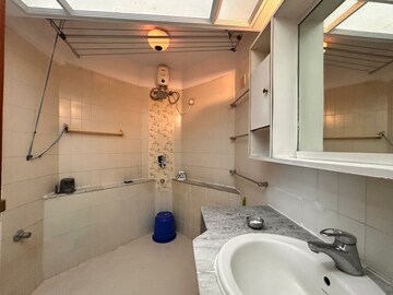 Bathroom in 2 BHK Apartment at Hiranandani Garden Eden IV, Powai – for Rent