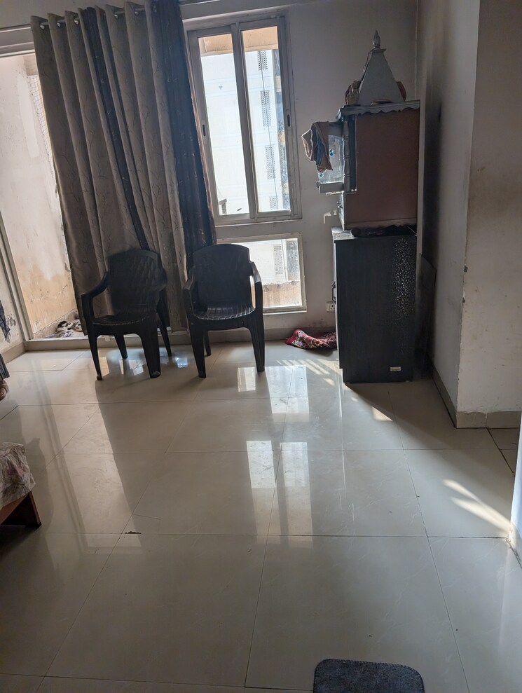 Living Room, jaypee-greens-kosmos 2 Bedroom 942 Sq.Ft. Apartment In Sector 134 Noida 9031651